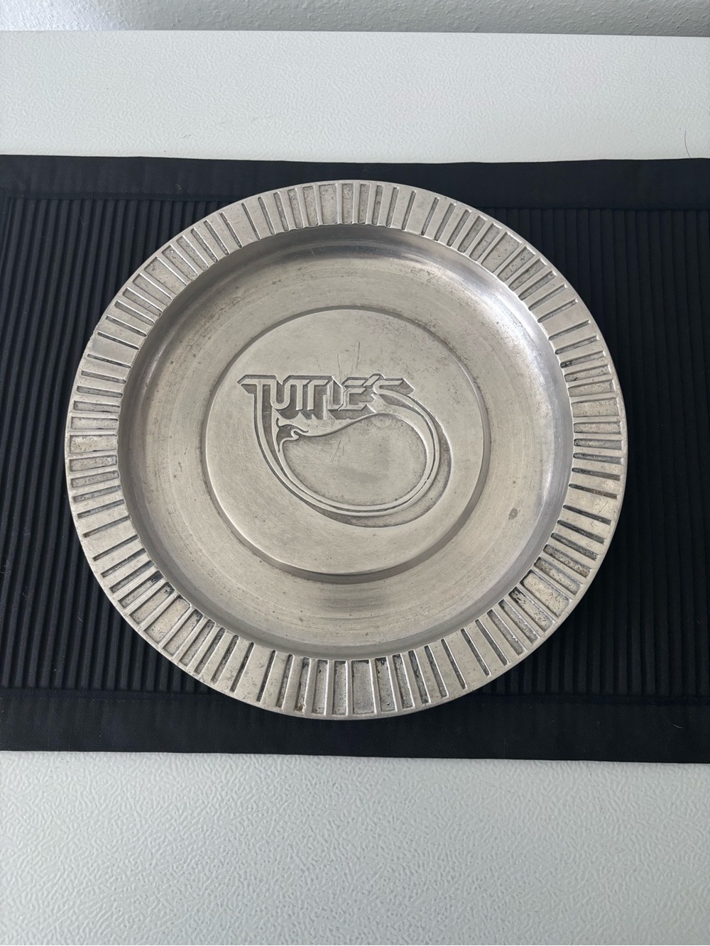 Puter Tutles Emblem Decorative Platter from the same restaurant
